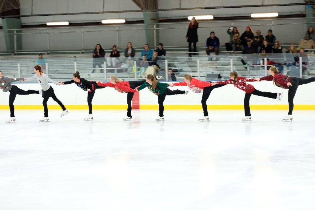 group of synchronized figure skaters