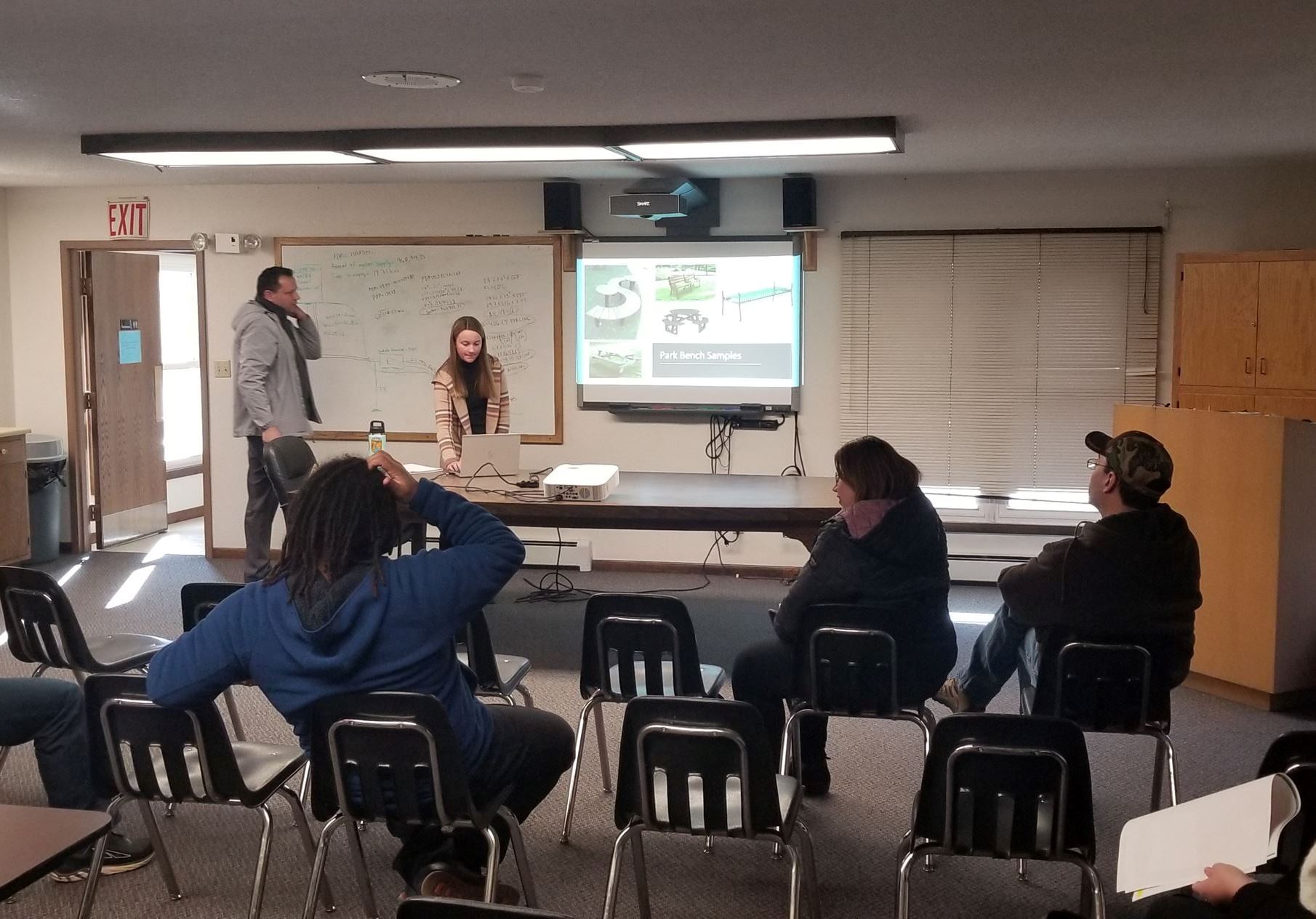 People in community meeting